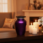 Load image into Gallery viewer, A metallic purple urn with a black lid and silver collar, shown on a plain white background with a 'PACK' label in the bottom right corner.