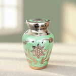 Load image into Gallery viewer, SOULURNS Mini Keepsake Cremation Urn for Human Ashes – Small Brass Memorial Urn, Green Enamel with Nickel Floral Engraving, Miniature Urn for Sharing Ashes