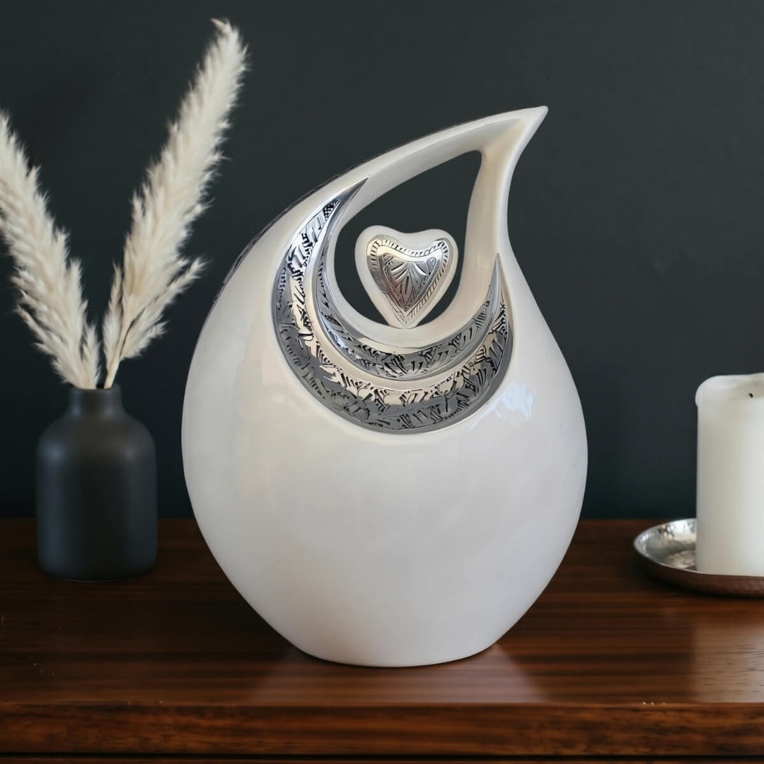 SOULURNS Cream Teardrop Cremation Urn – Silver Heart Embossed Memorial Urn for Ashes